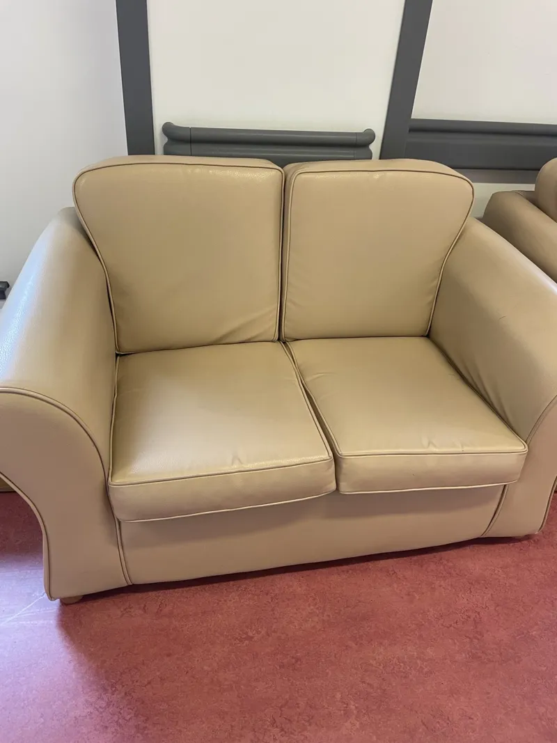 2 x Cream coloured two-seater sofa's