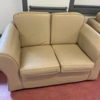 2 x Cream coloured two-seater sofa's