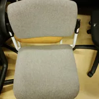 Grey stacking chair