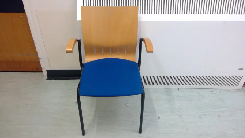Wooden Stacking Chair with Blue Seat Pad and Armrests