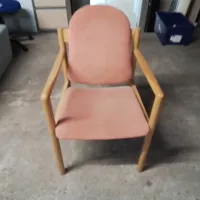 Pink Upholstered Armchair with Wooden Frame