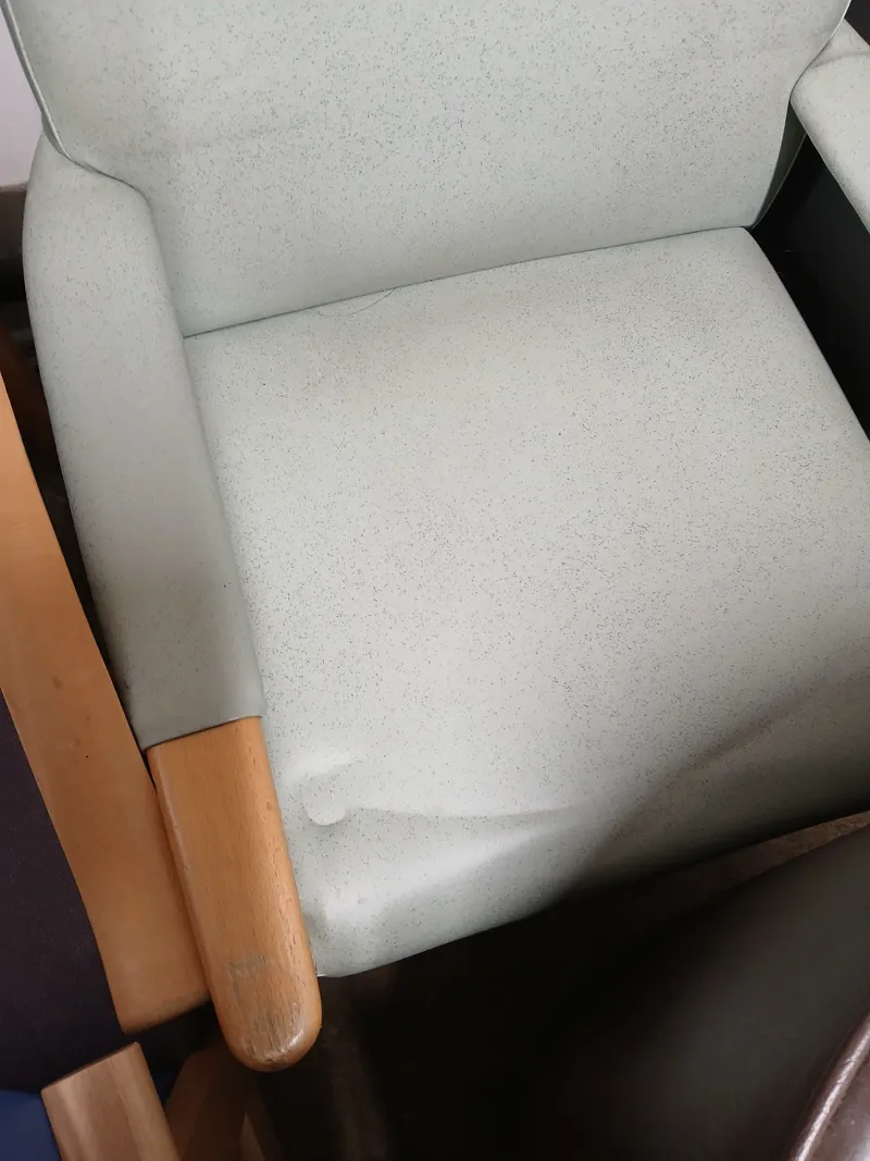 Cream Upholstered Armchair with Wooden Legs