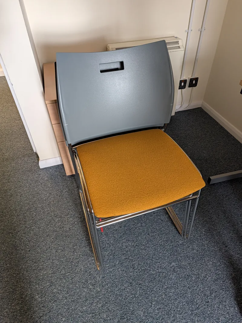 x 3 orange meeting chairs