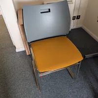 x 3 orange meeting chairs