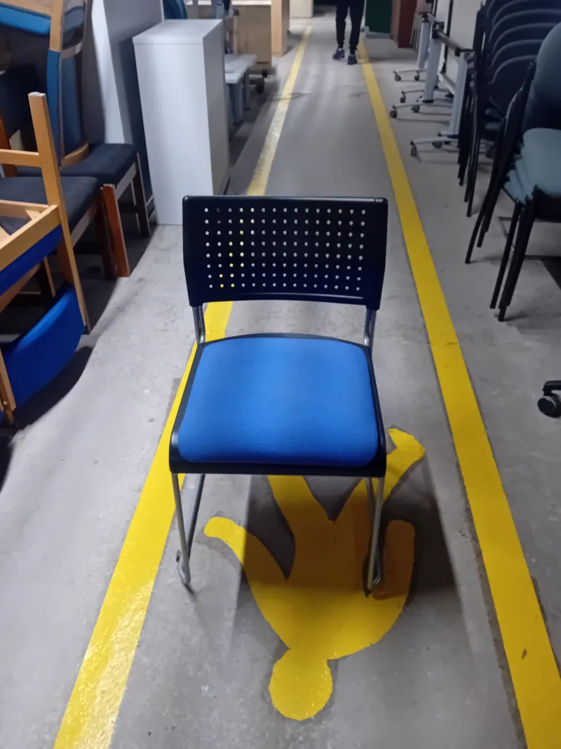 Stacking Chair with Blue Seat and Perforated Back