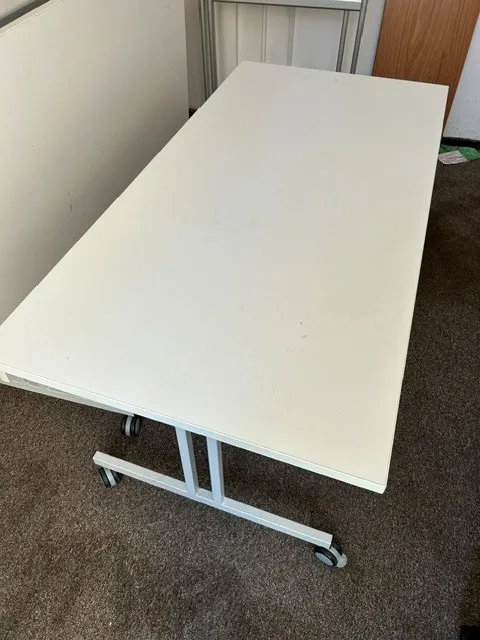 White Folding Table with Metal Frame and Castor Wheels