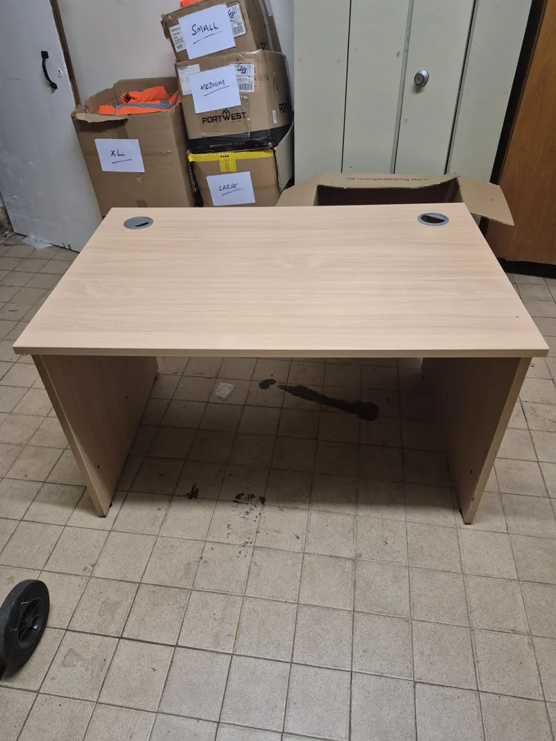 Light wood office desk with cable management