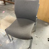 Grey Upholstered Stacking Chair with Metal Frame